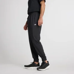 New Balance treenihousut Sport Essentials Woven Jogger